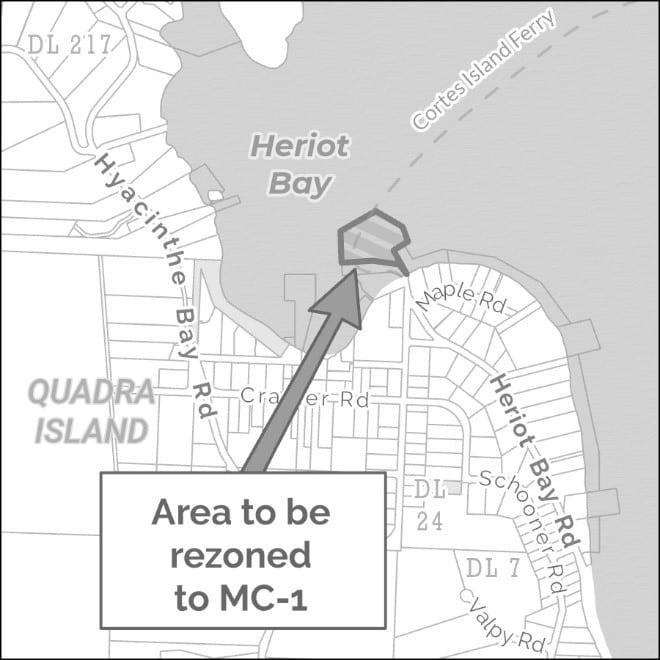 Map highlighting Heriot Bay area to be rezoned to MC-1, showing roads and coastline.
