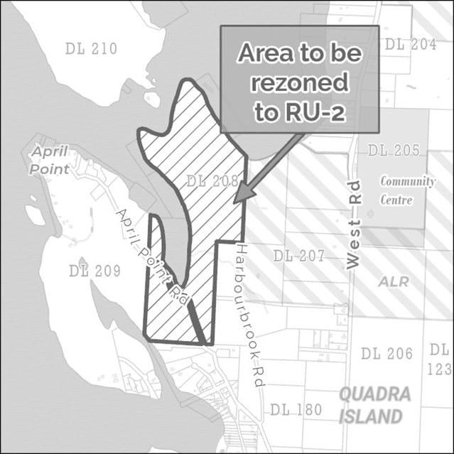 Map highlighting rezoning area on Quadra Island with striped pattern.
