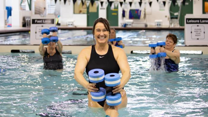 Staff in water doing aquatic fitness