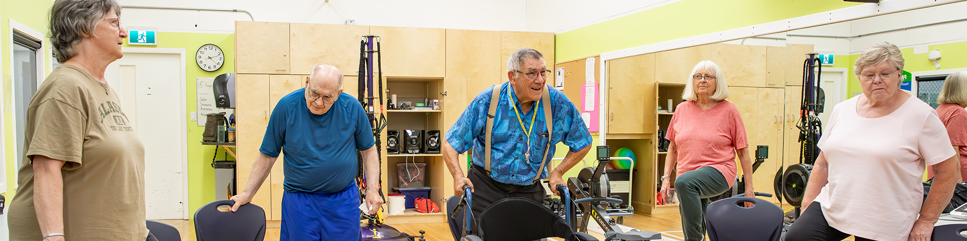 A group of older adults engaged in a discussion