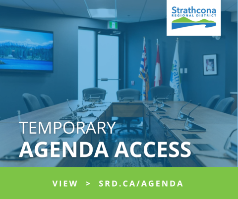 Conference room with long table, chairs, and flags; Strathcona Regional District logo.