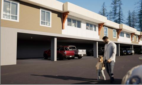 A man and a child walking near parked cars in a modern residential area.