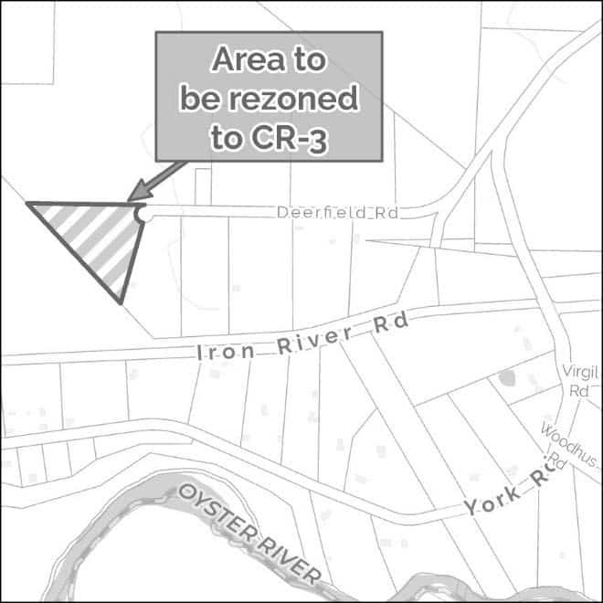 Map highlighting a triangular area for rezoning near Deerfield Rd.