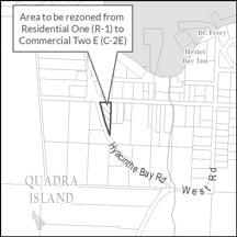 Map highlighting area rezoned from Residential One to Commercial Two E on Quadra Island.